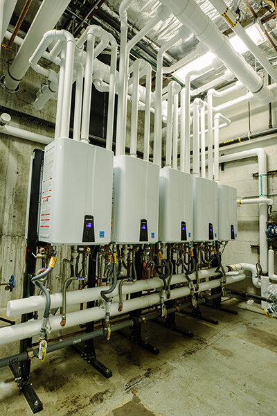 bank of 10 NPE tankless water heaters